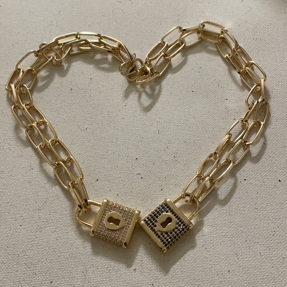 Lot of two paddle lock necklaces